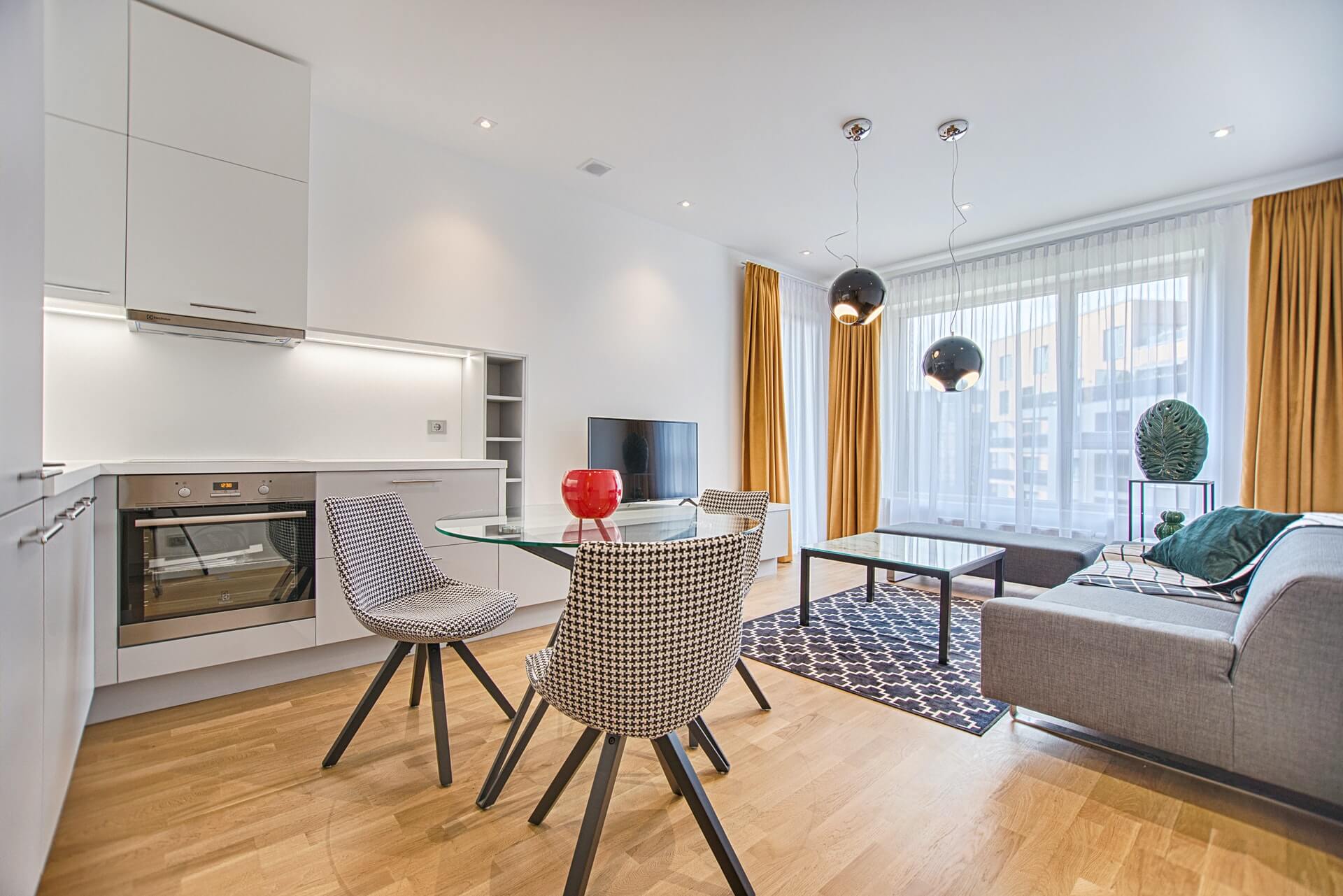 two-chairs-with-glass-table-on-living-room-near-window.jpg two-chairs-with-glass-table-on-living-room-near-window.jpg